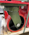 Close-up of polyurethane wheel on Economical Heavy Duty Hydraulic Machinery And Equipment Mover With Adjustable Forks Up To 12000 Lb Capacity.