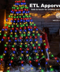 Outdoor Christmas Star Lights 11.5 Foot String With 317 LEDs Multicolor 8 Modes And Timer installed on Christmas tree