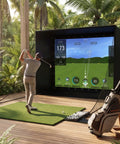 Person using Indoor Golf Simulator Enclosure Kit 11 By 8 Feet With 4K Ready Impact Screen Blackout Cage in home setup