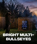 Archer practicing with Reusable Self Healing Rubber Archery Target Face Roll Up Practice Target Sheet With Bright Bullseyes at dusk