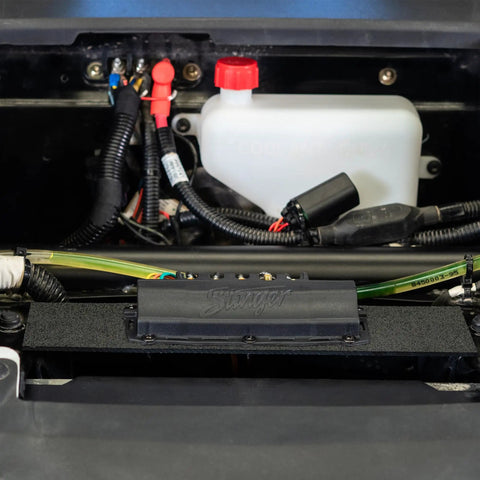 4 Channel 100 Amp Solid State Relay Block installed in marine vehicle with visible wiring and components