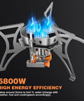 Close-up of Powerful 6800W Windproof Camping Stove For Backcountry Cooking with blue flames, showcasing portable design.