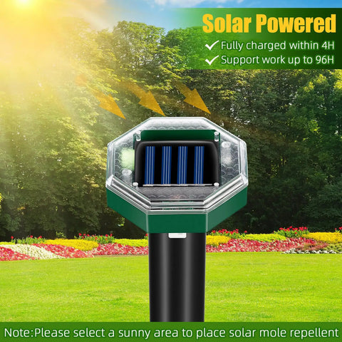 Close-up of Solar Mole Repellent Stake in garden; charges under sun; features include solar power, 4-hour charge, 96-hour use