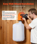 Man installing Wall Mount Dust Collector With 1 HP Motor Delivers 560 CFM For Woodworking Shops on wooden wall