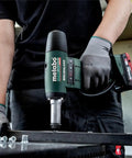 Top Shelf 18V Cordless Rivet Nut Gun With Hella Precision Adjustable Settings in use on metal surface with fasteners.