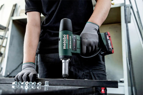 User operates Top Shelf Professional Cordless Rivet Nut Gun Featuring Auto Reverse Mechanism And Adjustable Force Control For M10 Aluminum M8 Steel Fastening Tool Body Only In Box.