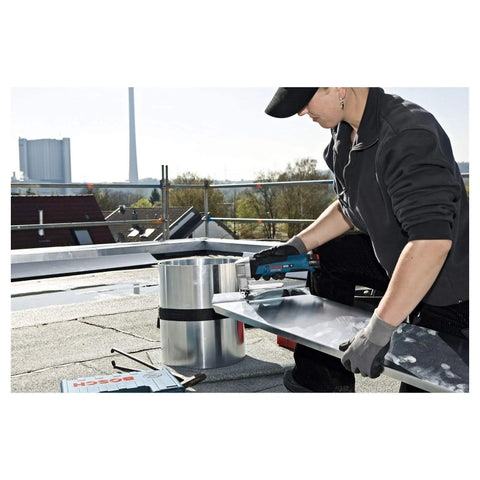 Heavy Duty Pro Grade 12V Cordless Metal Shear Cuts Steel Four Times Faster With Zero Sweat For Flawless Straight And Curved Cuts Up To One Point Three Millimeter Thick No Battery Or Charger being used on metal sheet.