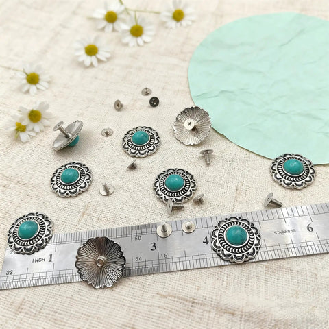 Straight Fire Green Turquoise Concho Buttons 10 Pack With Screw Back Fasteners arranged on fabric with ruler and flowers.
