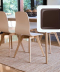 Eight Pack Self Stick Furniture Sliders Brown Square Self Adhesive Carpet Sliders under chair leg in dining room