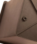 Close-up of drain plug in waterproof liner pot from All Weather Wicker Planter Set Two Piece Mocha Outdoor Planters With Liners Tall Pots