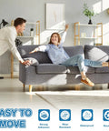 Smooth As Butter Heavy Duty Furniture Sliders Reusable Floor Protectors For Carpet Or Hardwood in use under a sofa on a hardwood floor.