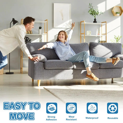 Smooth As Butter Heavy Duty Furniture Sliders Reusable Floor Protectors For Carpet Or Hardwood in use under a sofa on a hardwood floor.