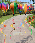 Rainbow Windsock Set Of 3 Hot Air Balloon Wind Spinners for outdoor garden with colorful spirals, vivid stripes on pathway