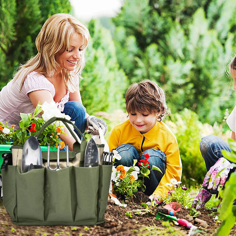 Heavy Duty Canvas Garden Tool Bag With Eight Pockets Large Tote Organizer for Indoor Outdoor Gardening on green background