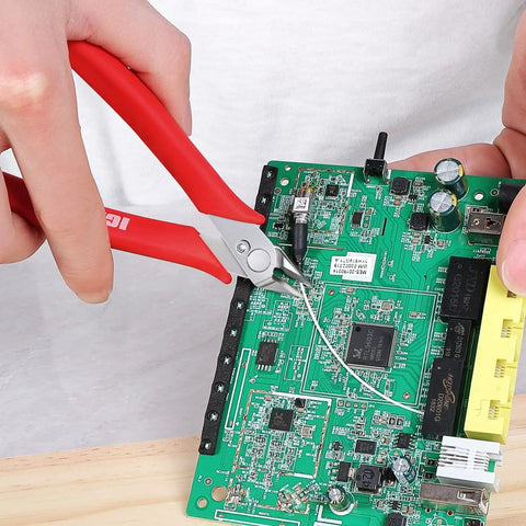 Precision Wire Cutters Flush Cutters For Electronics And Jewelry Making, Spring Loaded Side Cutting Pliers cutting wire on a circuit board