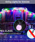 Outdoor Smart String Lights With App Control illuminating a patio in rain, 50 Feet Waterproof RGB G40 LED Bulbs.