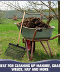 Replacement 18 Tine Manure Fork Head 2 Pack With Screws And Nuts and wheelbarrow filled with manure on grassy field