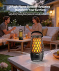 Couple enjoying evening with 2 Multi Sync Bluetooth Lantern Speaker With Lights And 360 Degree Stereo Sound on outdoor patio.
