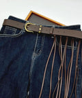 Dope Fringe Belt With Antique Bronze Buckle And Adjustable Waist Strap For Vintage Industrial Vibes And Edgy Streetwear Fits Dynamic Tassel Design on jeans.