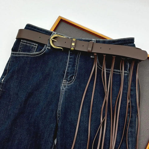 Dope Fringe Belt With Antique Bronze Buckle And Adjustable Waist Strap For Vintage Industrial Vibes And Edgy Streetwear Fits Dynamic Tassel Design on jeans.