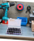 Shop Grade Metric Socket Head Cap Screw Assortment Kit With 1600 Pieces placed on a workshop bench with tools.