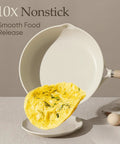 Person serving omelet with 8 Inch White Granite Nonstick Frying Pan Skillet With Heavy Duty Cast Aluminum Induction Base