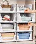 Five Pack Stackable Closet Storage Baskets Set Waterproof Foldable Organizer White in use organizing clothes and hats