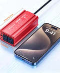 Heavy Duty Car Power Inverter Dc 12V To Ac 110V With Pd Fast Charging Dual Usb Ports and two standard outlets beside a smartphone.