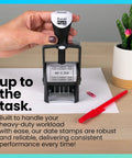 Top Shelf Heavy Duty Self Inking Date Stamp Black Customizable Up To Four Lines Of Text displayed with paper and pen.
