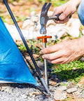Hammer driving Heavy Duty Galvanized Tent Stakes Ten Pack: Rust-Proof Steel Canopy Anchors For High Winds into ground