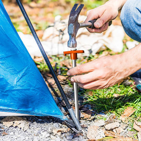 Hammer driving Heavy Duty Galvanized Tent Stakes Ten Pack: Rust-Proof Steel Canopy Anchors For High Winds into ground