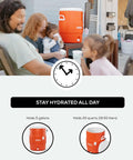 Family enjoying outdoors with 10 Gallon Portable Sports Cooler And Beverage Dispenser With Flat Seat Lid Insulated Orange White.