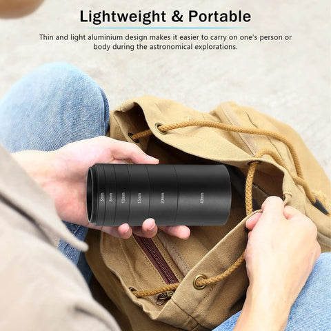 Person holding Astronomy T2 Extension Tube Kit for Cameras and Eyepieces with 5-40mm Spacers, lightweight for portability.
