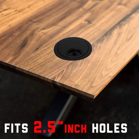 2.5 Inch Plastic Cable Grommet installed on wooden desk, fits 60mm hole, for wire management and cord organization.
