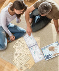 Couple assembling LED Jellyfish 3D Wooden Puzzle Kit For Adults With 355 Pieces That Swims When LED Lights Up Realistic Display Build DIY Wood Craft Toy Gift For Him And Her Cool Creative Hobby And Unique Educational Toy on carpet