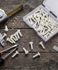 50 Pack White 632 X 1 2 Slotted Switch Plate Screws Includes Tidy Latch Container on wooden surface with tools.
