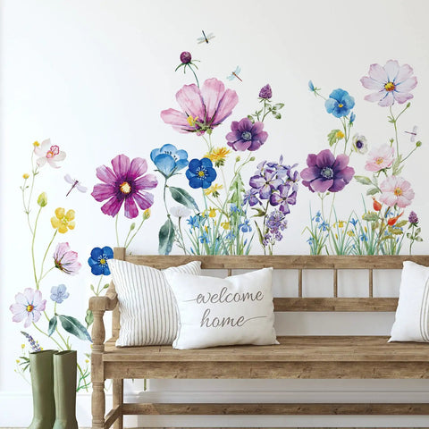 Six Piece Colorful Flower Wall Decals Set With Dragonflies Removable Peel And Stick Vinyl Murals for bedroom decor, displayed behind a bench.