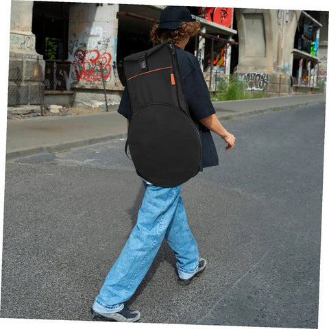 Yo Drummer Grab This Flat Out Tough Oxford Carrier Bag For Snare And Practice Pads worn by a person walking on a street.