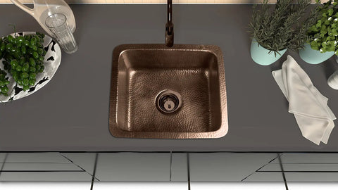 Top view of a Pure Copper Kitchen And Bar Sink With Hand Hammered Finish 17 Inch Highball Dual Mount Drop In Or Undermount Deep Rectangular Bowl.