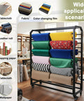 Heavy Duty Commercial Fabric Roll Storage Rack With 16 Adjustable Hanging Rods For Superior Cloth Organization displaying multiple fabric rolls in a workshop.
