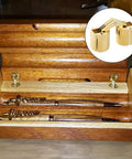 Eight Piece Set Of Eighteen Millimeter Concealed Brass Barrel Hinges Delivering A Full One Eighty Degree Swing For Cabinet Doors And Wood Furniture With Easy Mounting And Tough As Nails Construction in wooden display.