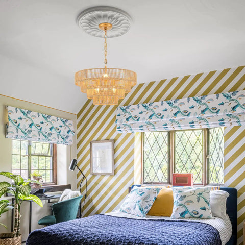 Bedroom with Six Light Hand Woven Rattan Pendant With Four Round Brass Frame Spheres over bed, transitional boho decor