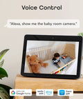 Tablet showing live feed from 1080P Security Camera With 24 Seven Live Streaming And Pan Tilt Zoom, Motion Detection, Night Vision, Two Way Audio, Crisp 1080P Video, Easy Setup, Works With Alexa And Google Assistant For Smart Home Surveillance in a baby room. Voice control command displayed above.