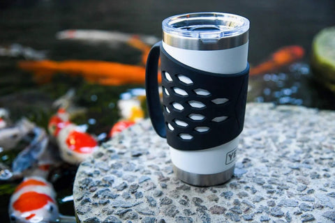 Protective Silicone Tumbler Sleeve With Handle for 20 Oz Stainless Steel Mugs near pond with koi fish
