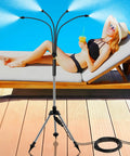 Adjustable Standing Misting System For Outdoor Patio, 4.1 Ft Height With Tripod Stand, 26.2 Ft Water Supply Line next to sunbed