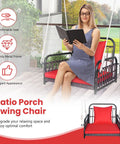 Woman reading on Red Wicker Porch Swing Chair For One With Cushioned Seat And Back, Reinforced Metal Frame, Rattan Weave Patio Swing Seat