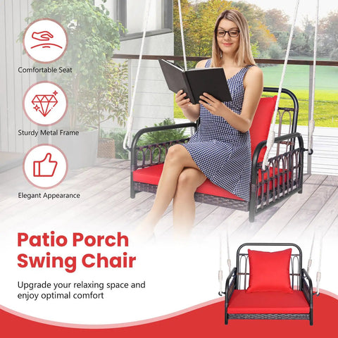 Woman reading on Red Wicker Porch Swing Chair For One With Cushioned Seat And Back, Reinforced Metal Frame, Rattan Weave Patio Swing Seat