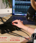 Person using Zen Quadro USB-C Podcast Interface With Four Studio-Grade Mic Preamps, Pro Conversion and Clocking, Built-In Studio Effects