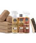Dime Quality Nine Piece Leather Cleaner And Conditioner Kit For Car Interiors With Soft Microfiber Towel, detailing supplies arranged on a white background.