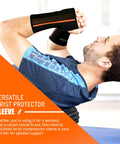 Man wearing wrist and forearm compression sleeve for carpal tunnel and joint pain relief, small adjustable support brace.